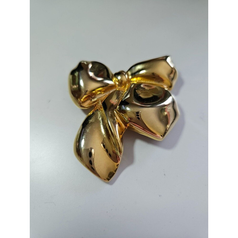 Danecraft gold tone bow brooch